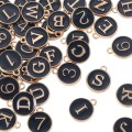 ZAW236 Zawieszki ALFABET LITERY literki cyfry zestaw 36szt metalowe z emalią czarne