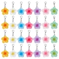 ZAW247 Zawieszki PLUMERIA kwiat zestaw 7szt mini breloki karabinek