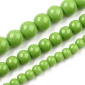 OPQ106 Koraliki szklane barwne 10mm 10szt pełny kolor zielony groszek