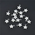 ZAW307 Zawieszki charm metalowe GWIAZDKA gwiazdki minka uśmiech 10sz