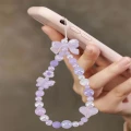 ST24 Smycz zawieszka brelok do telefonu motylek perły serduszko kawaii fiolet