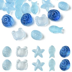 KSZ110 Koraliki szklane MORSKIE OCEAN rybka rozgwiazda muszelki 5szt blue