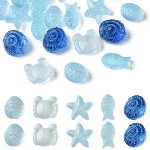 KSZ110 Koraliki szklane MORSKIE OCEAN rybka rozgwiazda muszelki 5szt blue