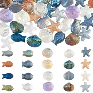 KSZ117 Koraliki szklane MORSKIE OCEAN rybka rozgwiazda muszelki 10szt mix