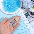KL54 Koraliki LITERKI LITERY alfabet monetki turkusowe niebieskie 7mm do bransoletki 100szt