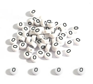 Koraliki literki białe monetki 7mm samogłoski literka litera O 20 sztuk