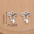 Zawieszki charm metalowe KOKARDKA kokarda do bransoletek 2szt