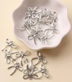Zawieszki charm metalowe KOKARDKA kokarda do bransoletek