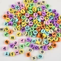 Koraliki literki PASTELOWE monetki 7mm bransoletki mix 100szt