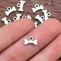 ZAW94 Zawieszki charm metalowe kostka kość do bransoletek 5szt